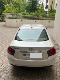 White Honda City SAT