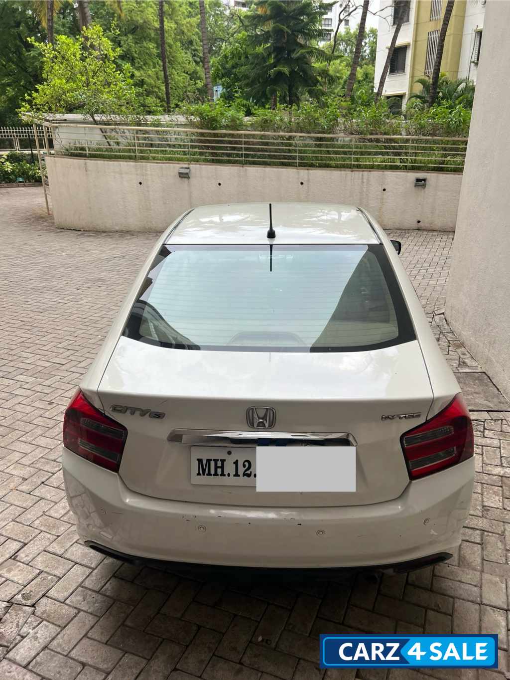 White Honda City SAT