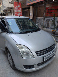 Silver Maruti Suzuki Dzire VXI BS4M