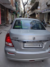 Silver Maruti Suzuki Dzire VXI BS4M