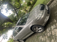 Grey Skoda Laura Elegance 2.0 TDI CR MT {200-2013}