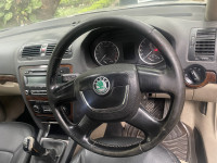 Grey Skoda Laura Elegance 2.0 TDI CR MT {200-2013}