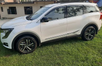 White Mahindra XUV700 Mx(petrol),5 star safety rating vehicle