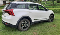 White Mahindra XUV700 Mx(petrol),5 star safety rating vehicle