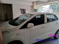 White Hyundai  Grand i10