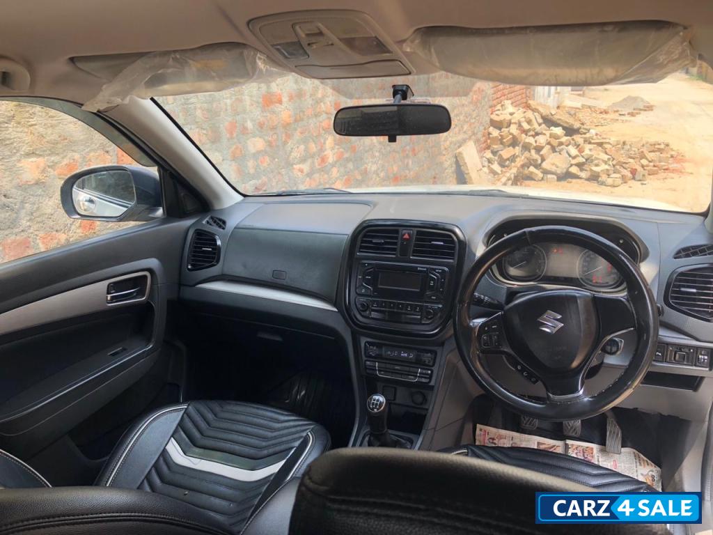 White Maruti Suzuki Vitara Brezza Zdi