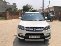 White Maruti Suzuki Vitara Brezza Zdi