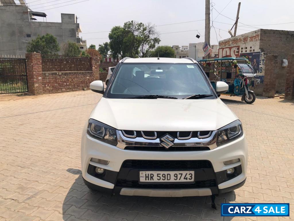 White Maruti Suzuki Vitara Brezza Zdi