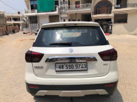 White Maruti Suzuki Vitara Brezza Zdi
