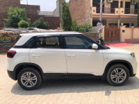 White Maruti Suzuki Vitara Brezza Zdi