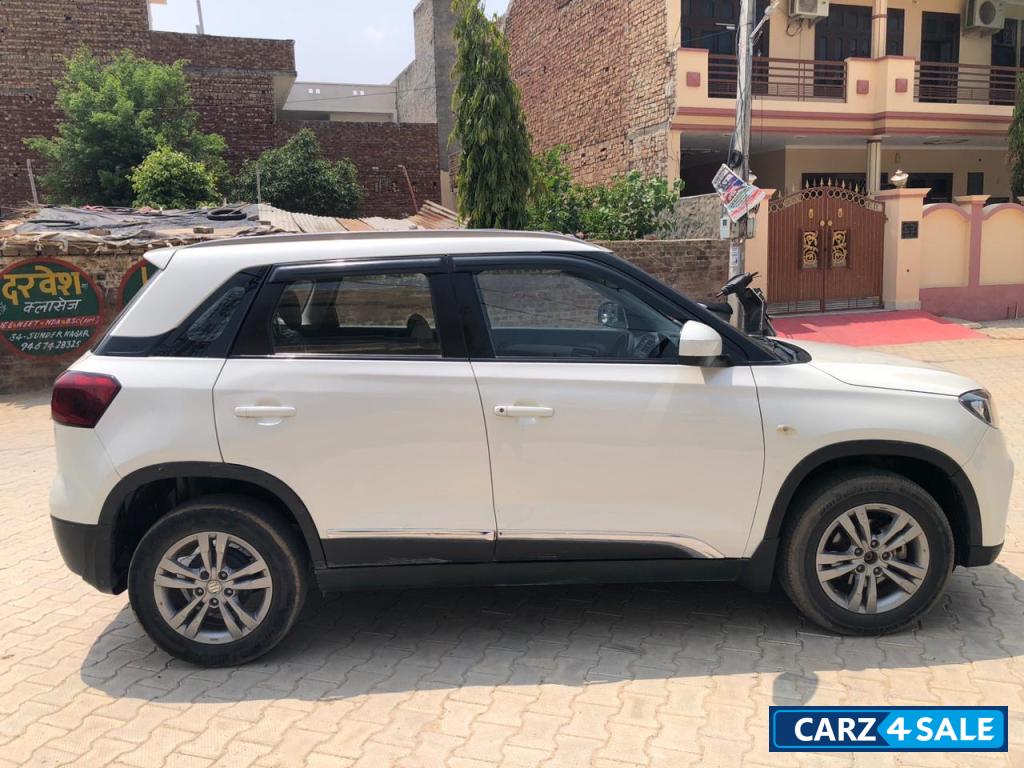 White Maruti Suzuki Vitara Brezza Zdi