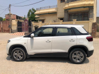 White Maruti Suzuki Vitara Brezza Zdi