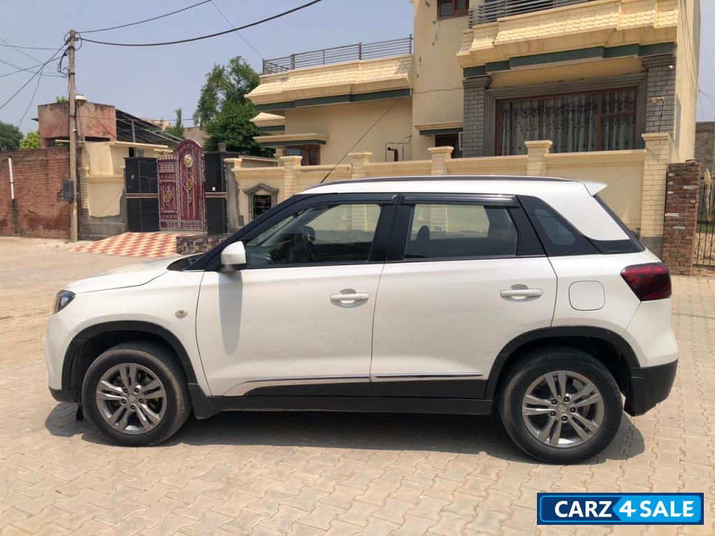 White Maruti Suzuki Vitara Brezza Zdi