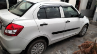 White Maruti Suzuki Dzire Tour S