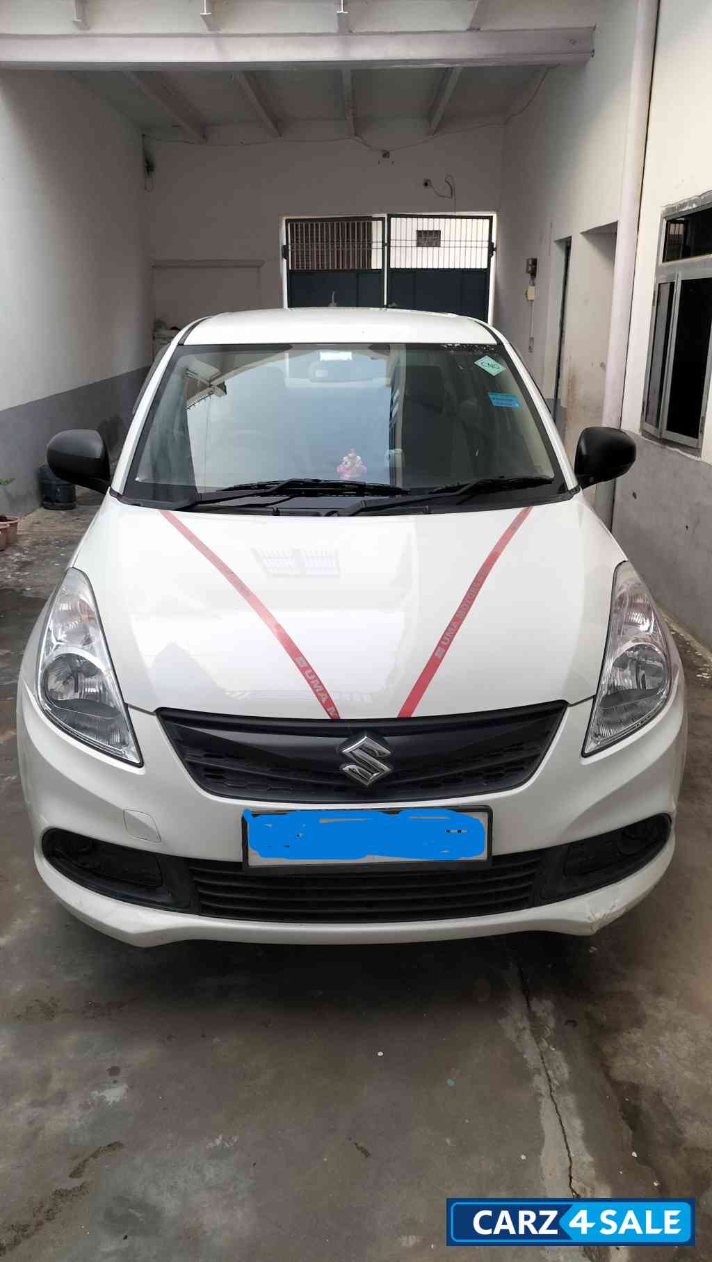 White Maruti Suzuki Dzire Tour S