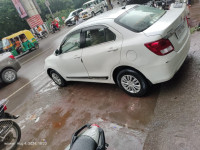 Pearl White Maruti Suzuki Dzire