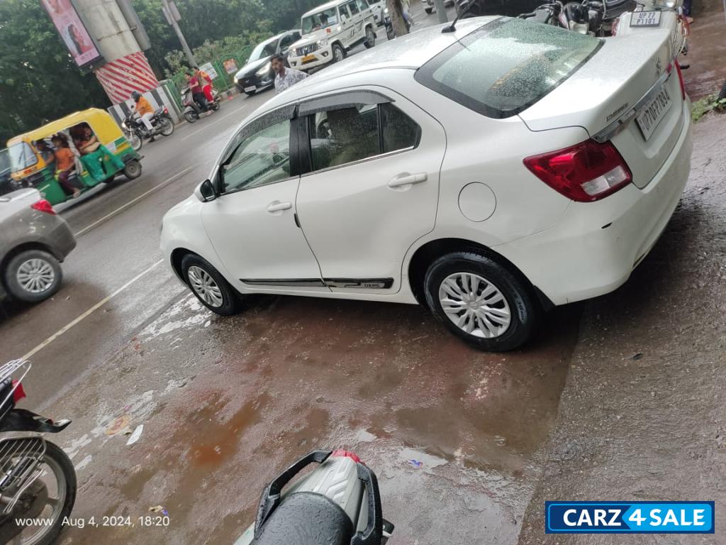 Pearl White Maruti Suzuki Dzire