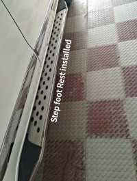 White Toyota Innova Crysta