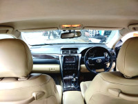 Silver Toyota Camry Hybrid 2.5