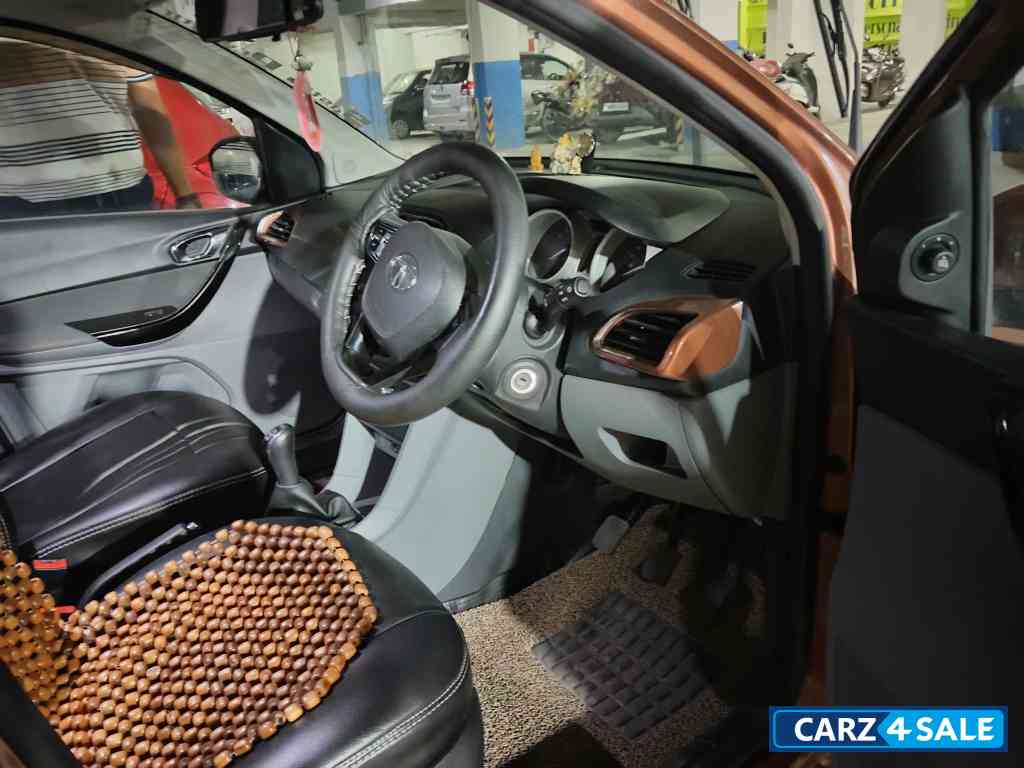 Copper Brown Tata Tigor XZ top end
