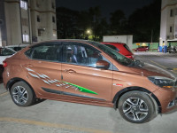 Copper Brown Tata Tigor XZ top end