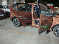 Copper Brown Tata Tigor XZ top end