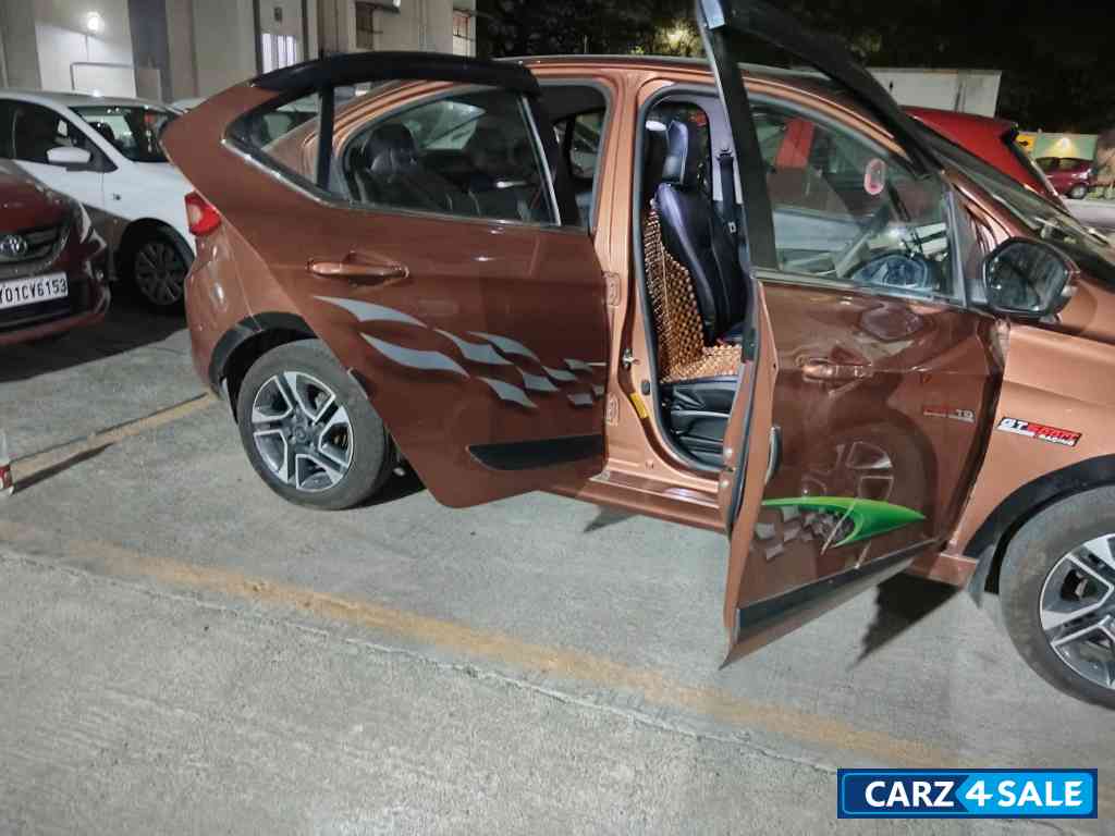 Copper Brown Tata Tigor XZ top end