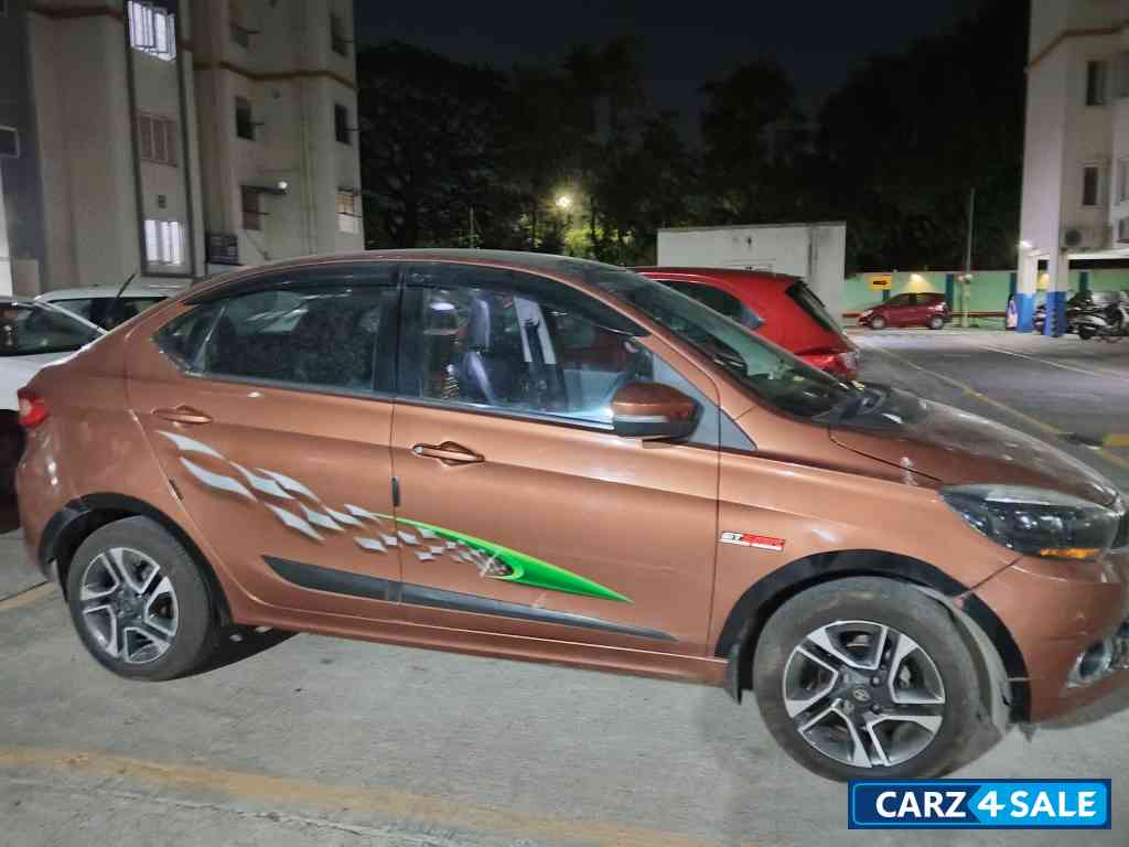Copper Brown Tata Tigor XZ top end