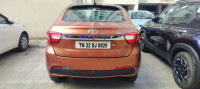 Copper Brown Tata Tigor XZ top end
