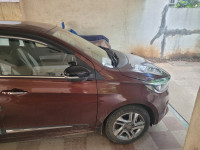 Magnetic Red Tata Tigor XZ+ petrol