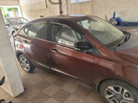 Magnetic Red Tata Tigor XZ+ petrol