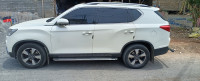 Pearl White Mahindra Alturas G4