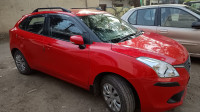 Fiery Red Maruti Suzuki Baleno Delta