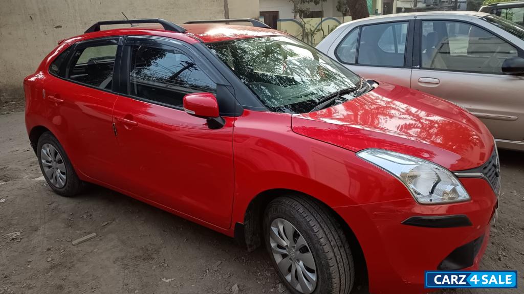 Fiery Red Maruti Suzuki Baleno Delta