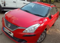 Fiery Red Maruti Suzuki Baleno Delta