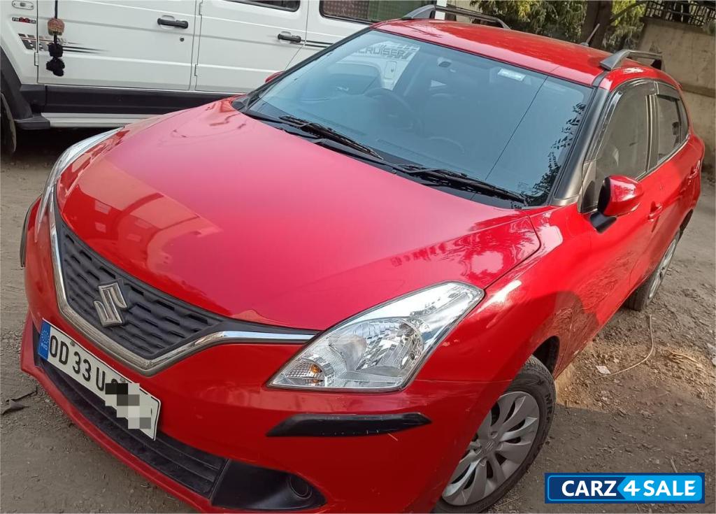 Fiery Red Maruti Suzuki Baleno Delta