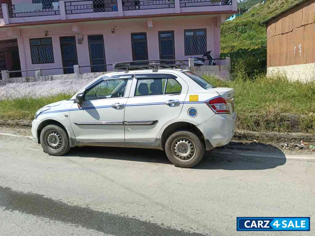Purl White Maruti Suzuki Dzire Tour diesel