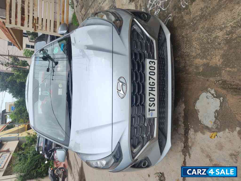 Typhoon Silver Hyundai Aura SX MT Petrol