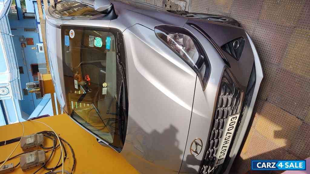 Typhoon Silver Hyundai Aura SX MT Petrol