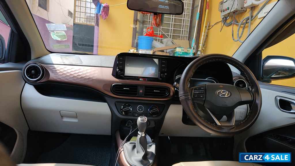 Typhoon Silver Hyundai Aura SX MT Petrol