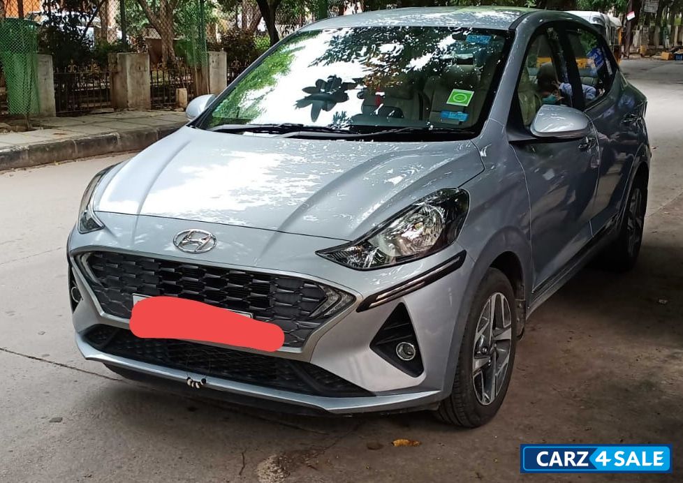 Typhoon Silver Hyundai Aura SX MT Petrol