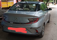 Typhoon Silver Hyundai Aura SX MT Petrol