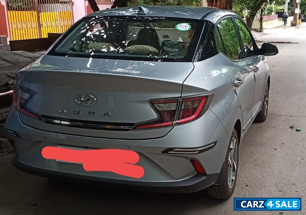 Typhoon Silver Hyundai Aura SX MT Petrol