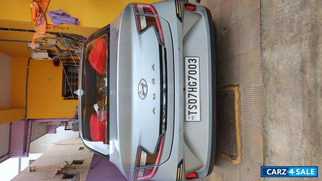 Typhoon Silver Hyundai Aura SX MT Petrol