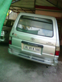 Silver White Toyota Qualis FS F2