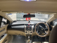 T White Honda City Lmv