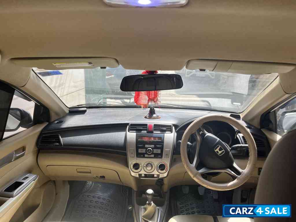 T White Honda City Lmv