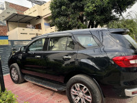 Black Ford Endeavour 4*4 titanium plus