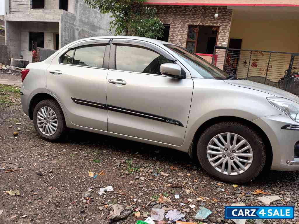 Silver Maruti Suzuki Dzire Zdi