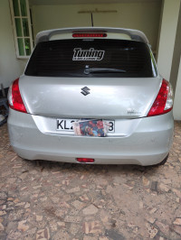 Bluish Silver Maruti Suzuki Swift ZXi